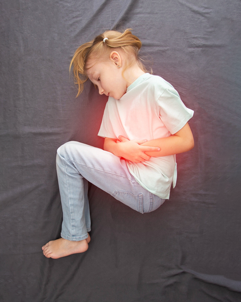 girl in stomach pain